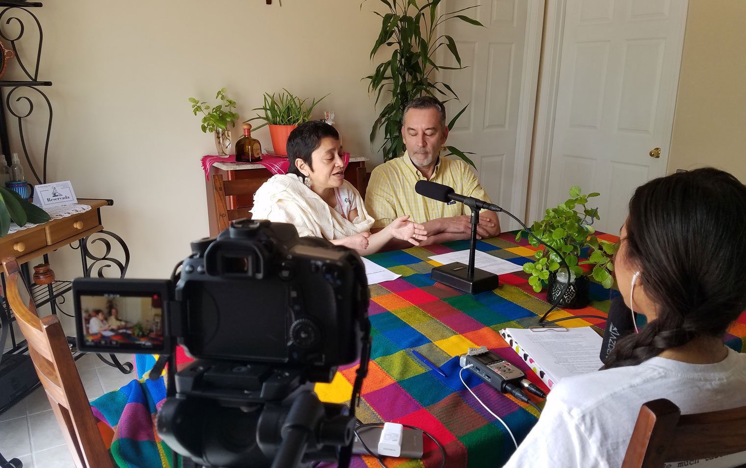 Norma Rosas and Manuel Apodaca and Norma Rosas, professors at the University of Southern Indiana, being interviewed by Paola Marizan for the first episode of podcast ¿Qué pasa, Midwest?